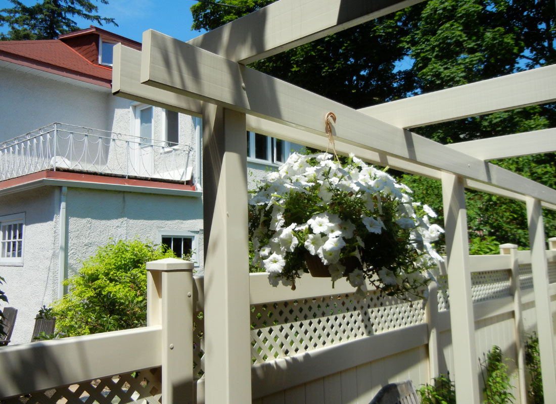 Garden Pergola & Walkway installed in Ottawa, Ontario by Fence Masters Ottawa — Pergola framing a garden walkway with clean, contemporary lines