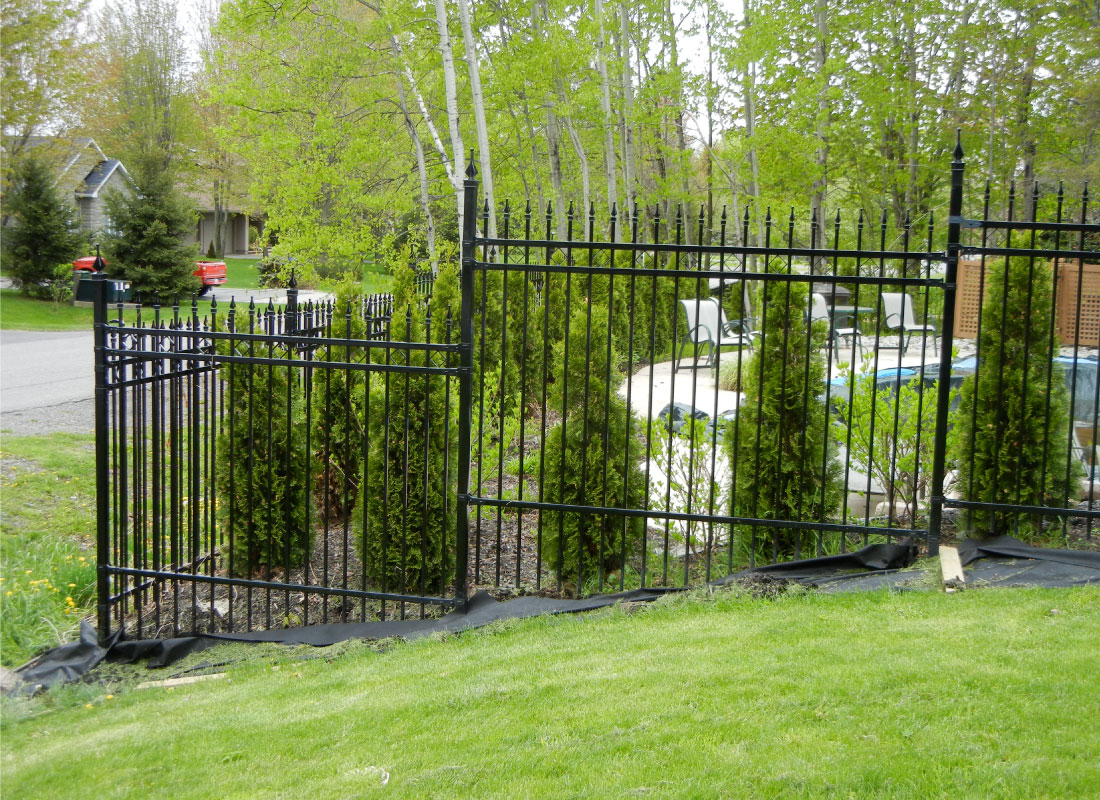 Pool-Code Iron Enclosure installed in Nepean, Ontario by Fence Masters Ottawa — Code-compliant pool enclosure with self-closing, self-latching hardware